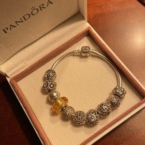 Authentic Pandora bracelet with 10 charms